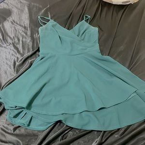 Zip up flowy dress straps adjustable.